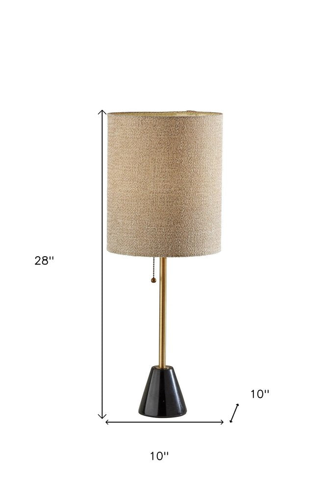 28" Black and Gold Marble and Metal Table Lamp With Beige Drum Shade. Table lamp isolated on a plain white background, finished in beige metal.