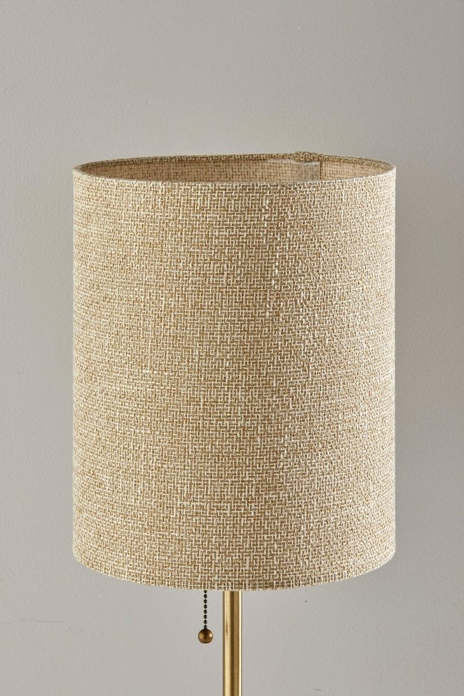 28" Black and Gold Marble and Metal Table Lamp With Beige Drum Shade. Table lamp isolated on a plain white background, finished in beige metal.