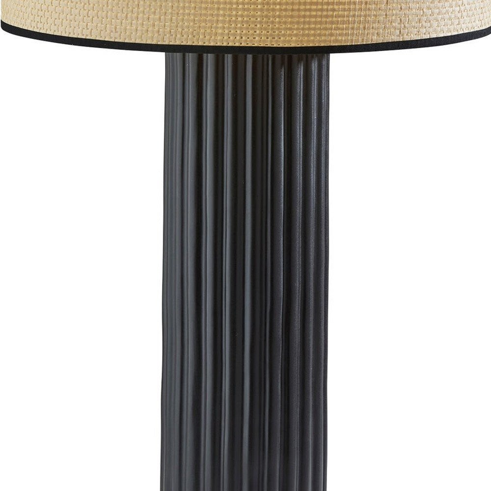 29" Black Ceramic Cylinder Table Lamp With Beige Drum Shade. Table lamp isolated on a plain white background, finished in beige ceramic.
