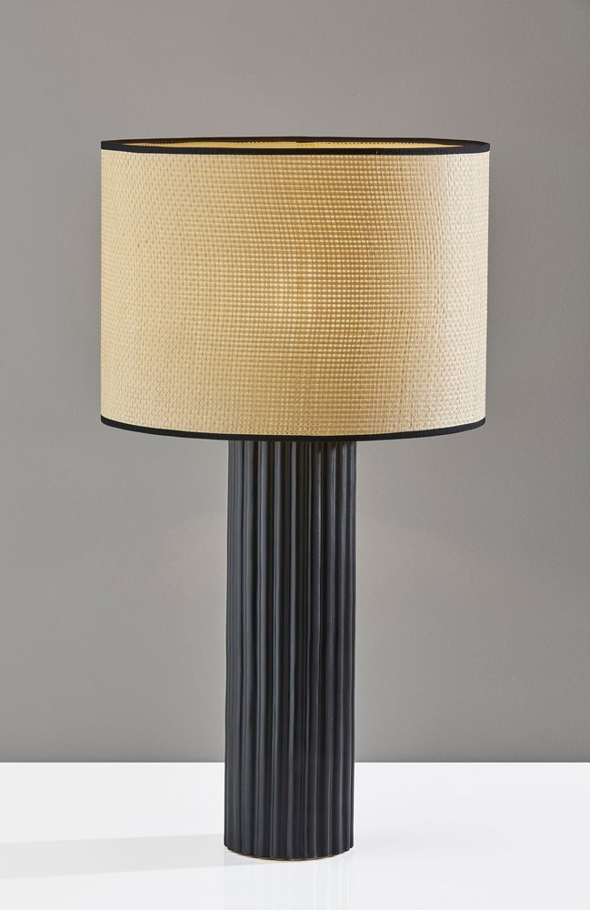 29" Black Ceramic Cylinder Table Lamp With Beige Drum Shade detail shot of the beige ceramic finish.