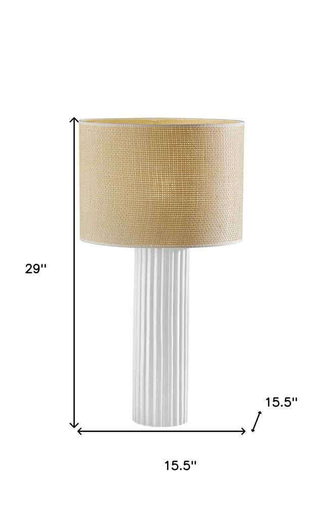 29" White Ceramic Cylinder Table Lamp With Beige Drum Shade. Table lamp isolated on a plain white background, in a beige ceramic finish.