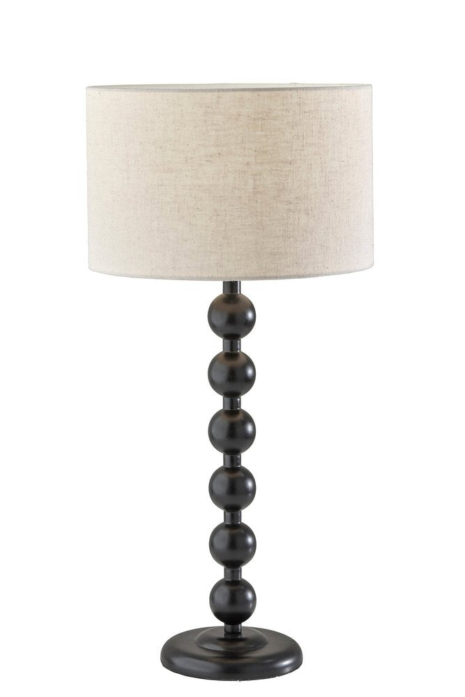 28" Black Solid Wood Candlestick Table Lamp With Off White Drum Shade. Table lamp isolated on a plain white background, finished in off-white wood.