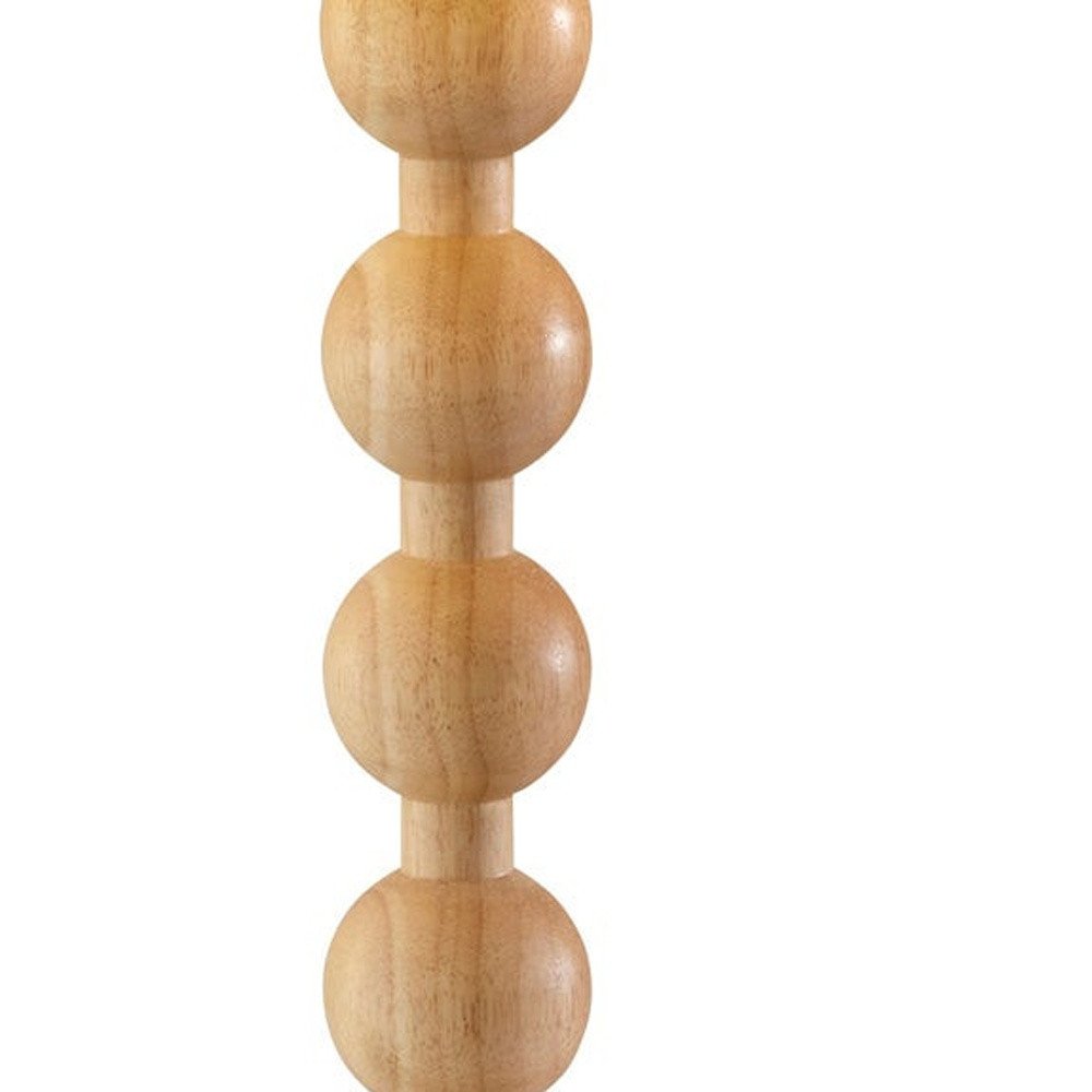 28" Brown Solid Wood Candlestick Table Lamp With Off White Drum Shade. Table lamp isolated on a plain white background, finished in off-white wood.