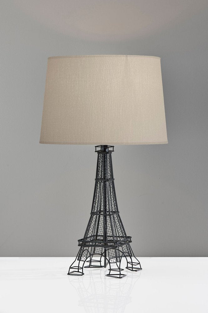 Cropped view of 25" Black Acrylic Paris Desk Table Lamp With White Drum Shade focusing on the white surface.