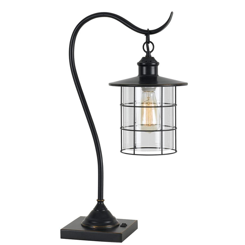 25" Bronze Metal Lantern Style Desk Lamp With Edison Bulb. Lamp isolated on a plain white background, showing a metal surface.
