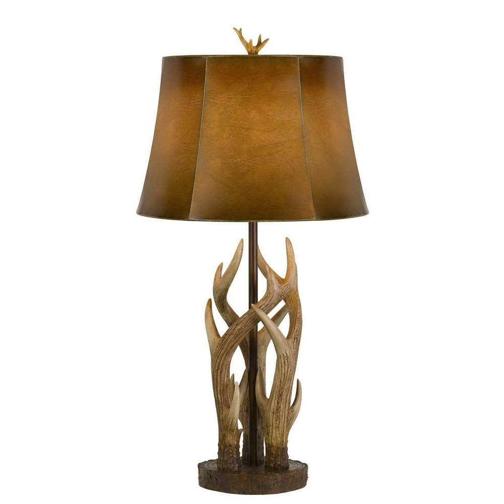 33" Brown Antlers Table Lamp With Brown Drum Shade. Table lamp isolated on a plain white background, finished in brown.