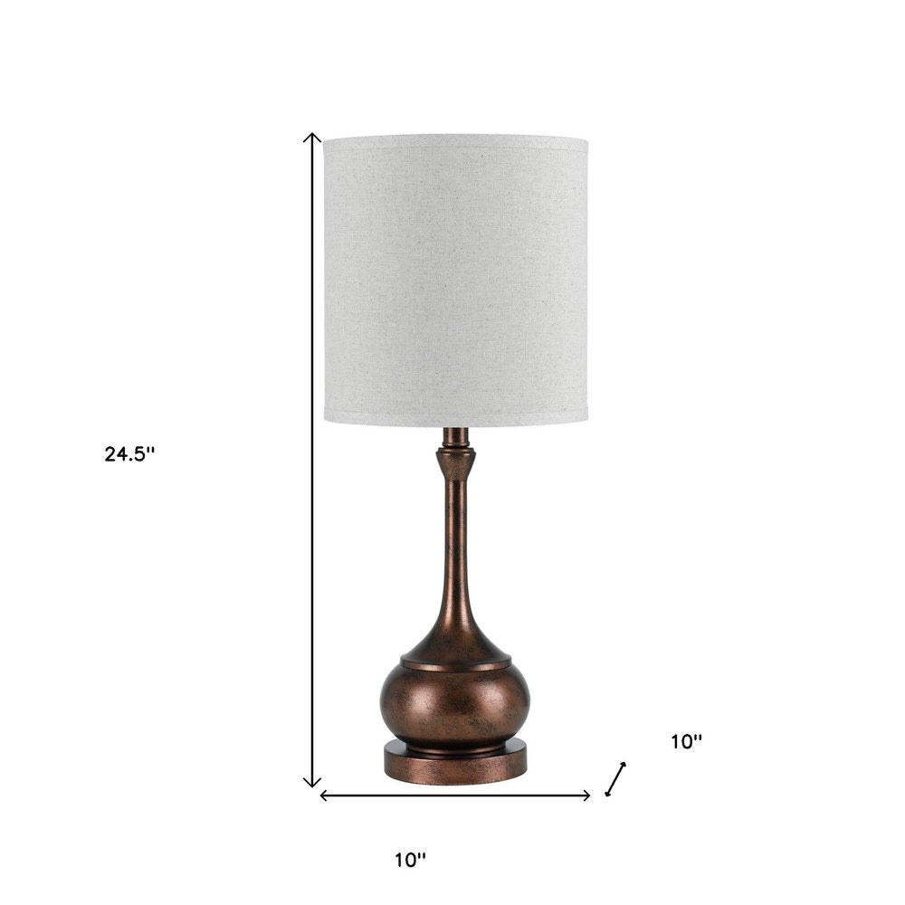 25" Rust Metal Round Table Lamp With White Drum Shade. Table lamp isolated on a plain white background, in a white metal finish.