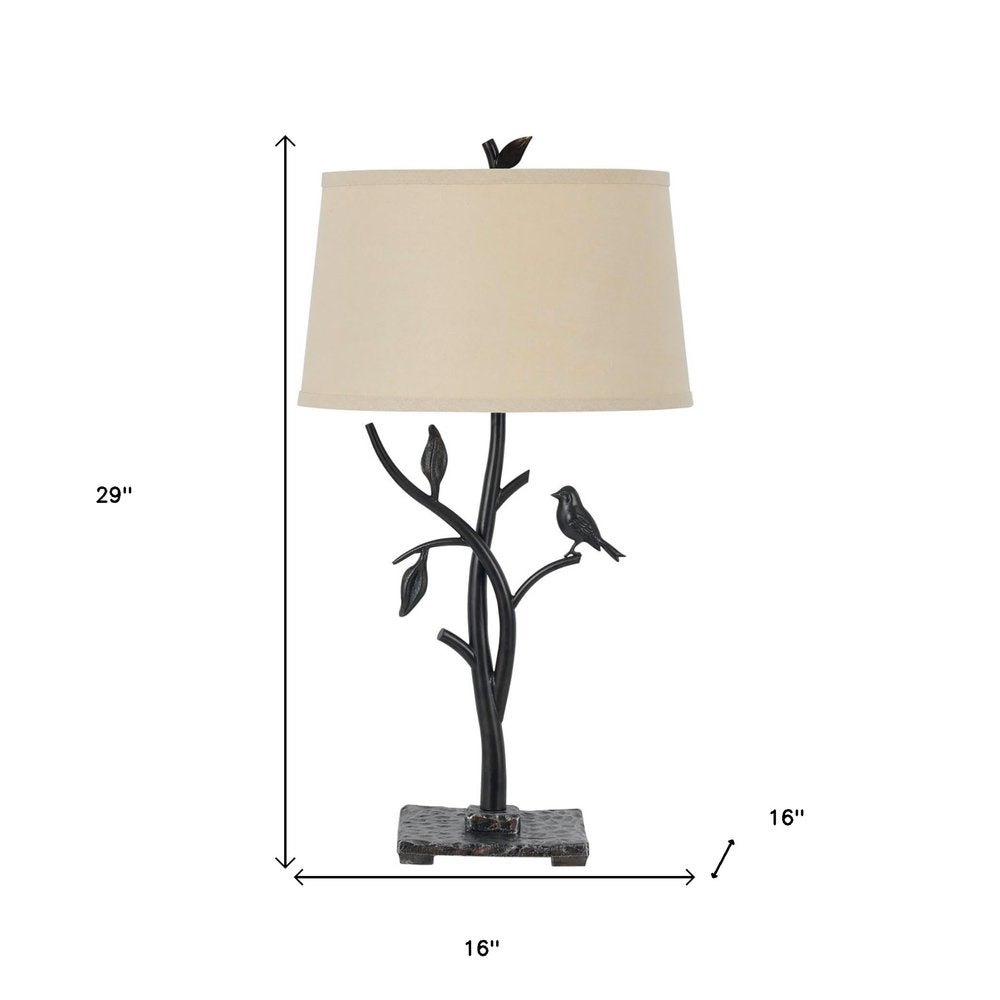 29" Tan Metal Table Lamp With Tan Empire Shade. Table lamp isolated on a plain white background, showing a cream metal surface.
