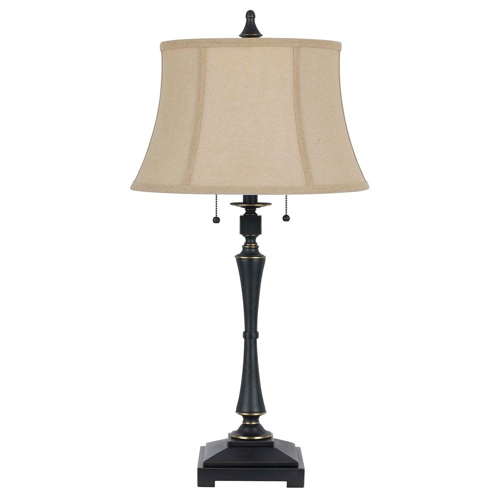 31" Black Metal Two Light Candlestick Table Lamp With Beige Empire Shade. Table lamp isolated on a plain white background, showing a beige metal surface.