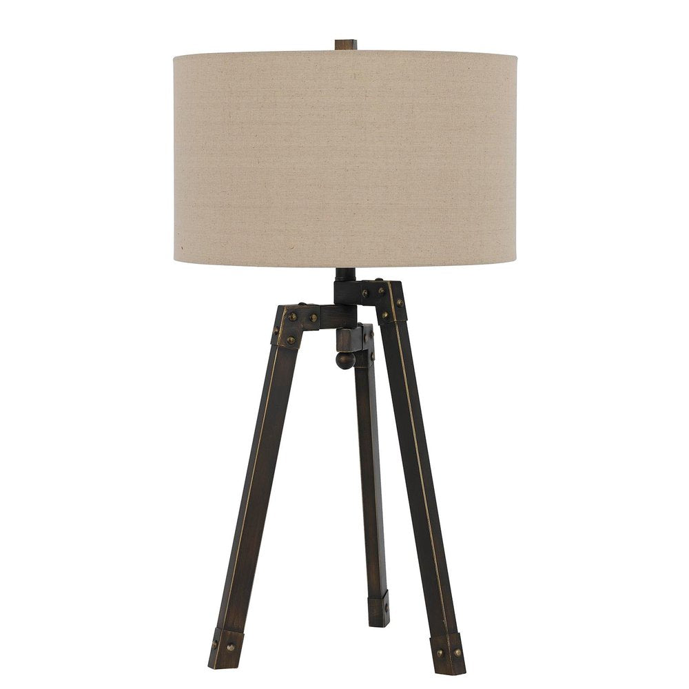 32" Charcoal Metal Tripod Table Lamp With Tan Drum Shade. Table lamp isolated on a plain white background, finished in charcoal metal.