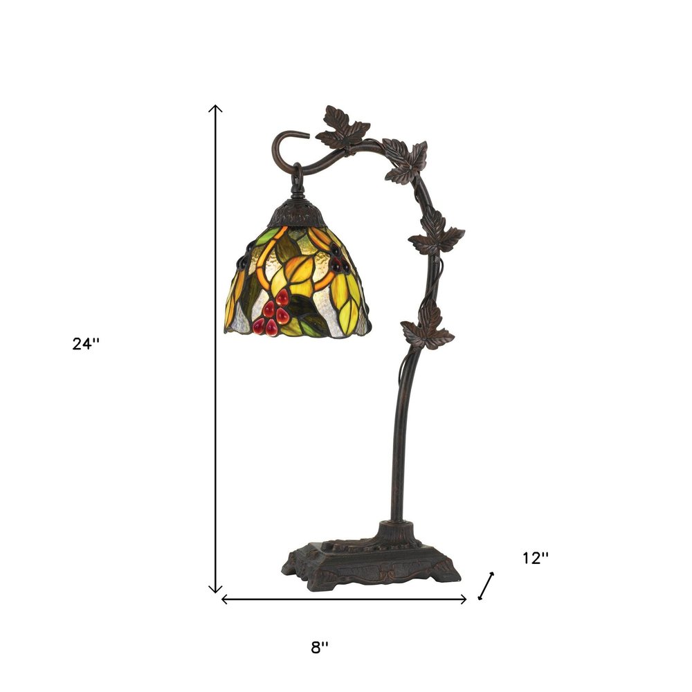24" Bronze Metal Tiffany Style Table Lamp With Hanging Stained Glass Shade. Table lamp isolated on a plain white background, showing a glass surface.