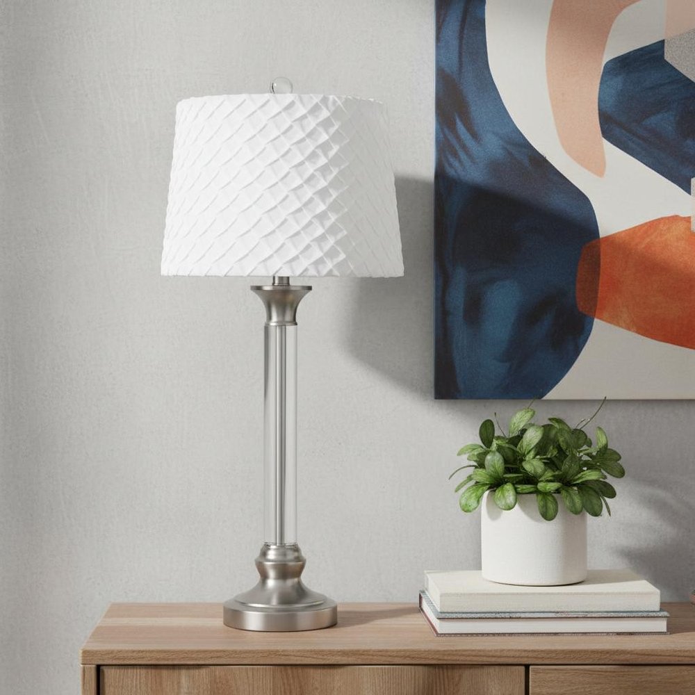 32" Nickel Metal Table Lamp With White Empire Shade displayed on a dark wood tabletop in a furnished interior against a light gray wall in silver metal.