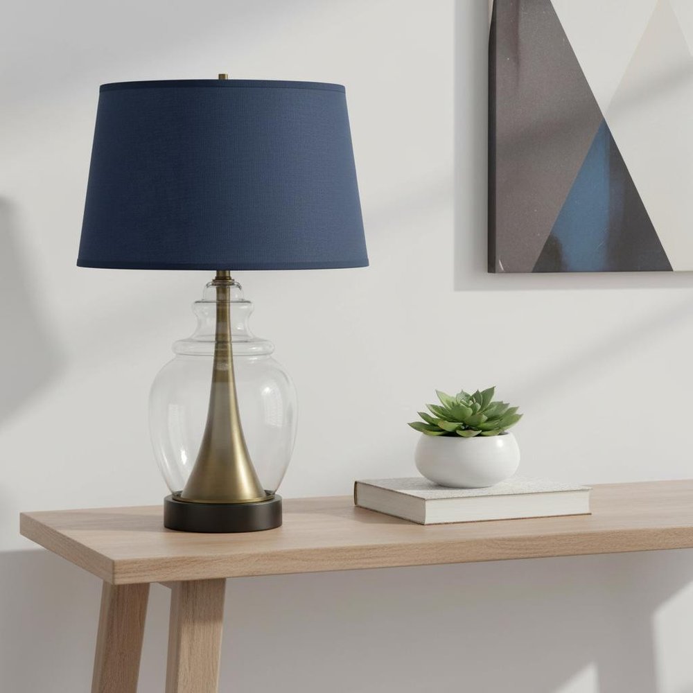 30" Black Metal Urn Table Lamp With Navy Blue Empire Shade. Table lamp isolated on a plain white background, showing a metal surface.