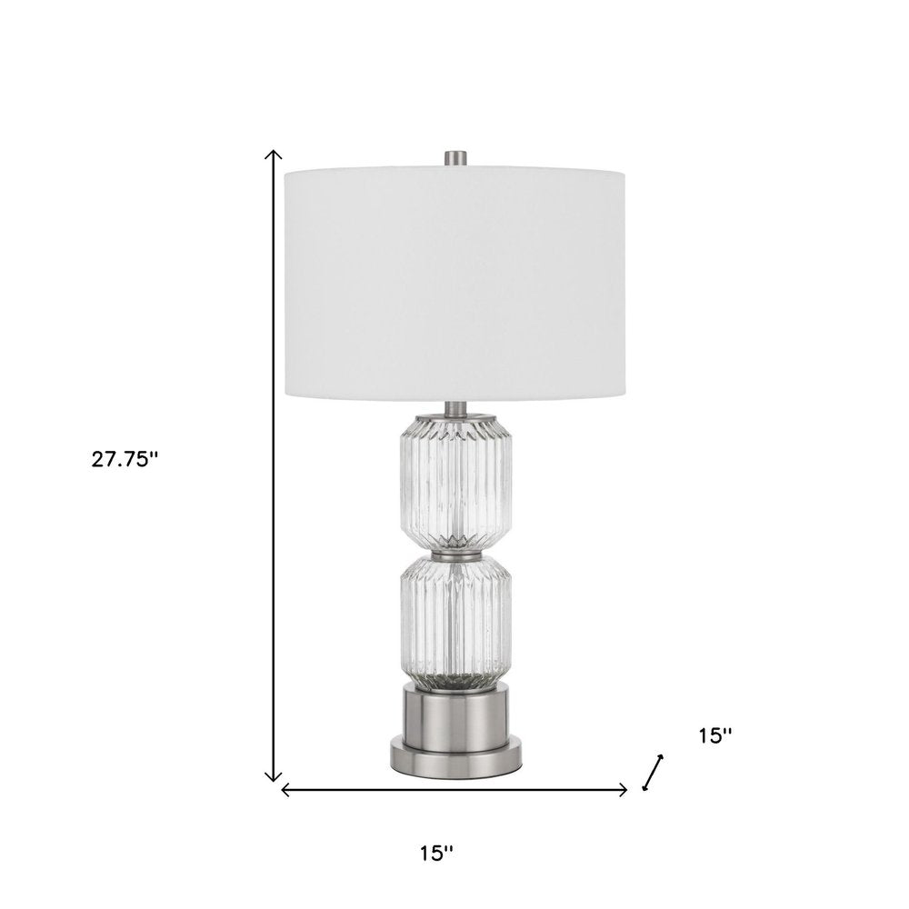 28" Nickel Metal Table Lamp With White Drum Shade. Table lamp isolated on a plain white background, in a silver metal finish.