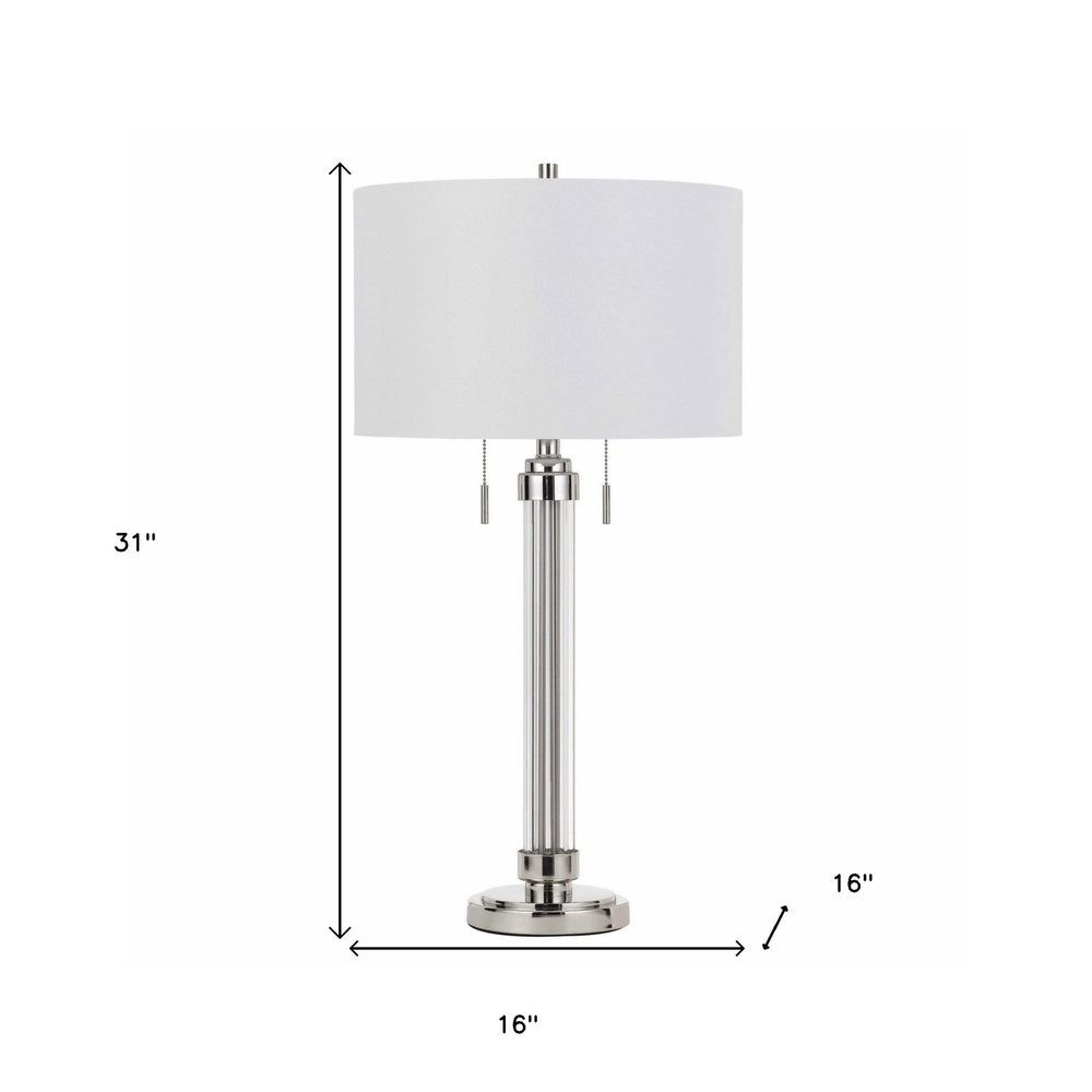 31" Silver Metallic Metal Two Light Cylinder Table Lamp With White Drum Shade. Table lamp isolated on a plain white background, in a silver metal finish.