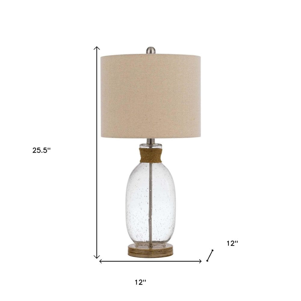 26" Brown Mason Jar Table Lamp With Brown Drum Shade. Table lamp isolated on a plain white background, in a brown finish.