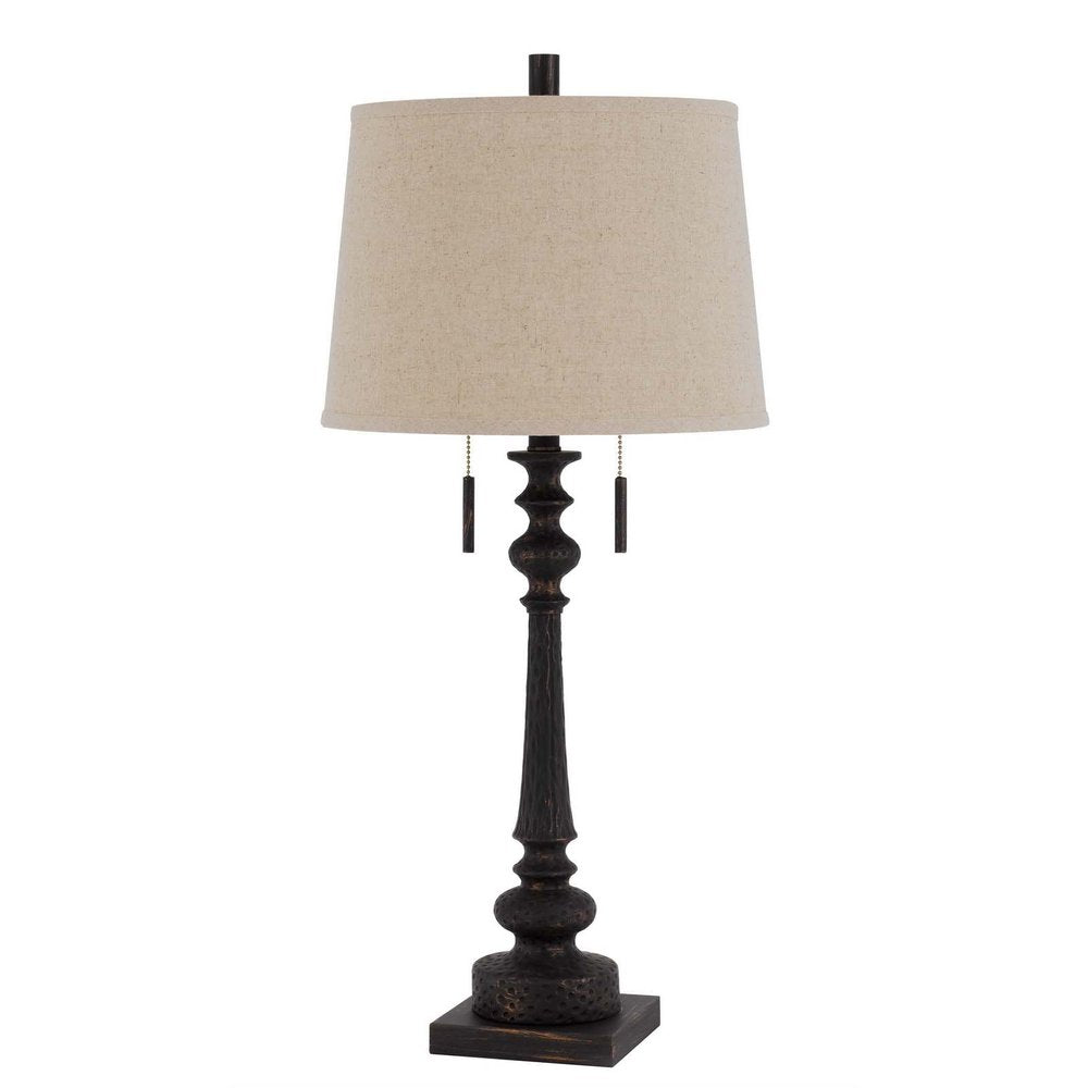 32" Charcoal Two Light Table Lamp With Tan Drum Shade. Table lamp isolated on a plain white background, finished in charcoal.