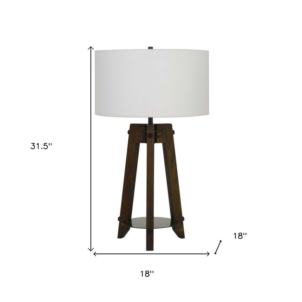 32" Brown Metal Tripod Table Lamp With Off White Drum Shade. Table lamp isolated on a plain white background, finished in off-white metal.