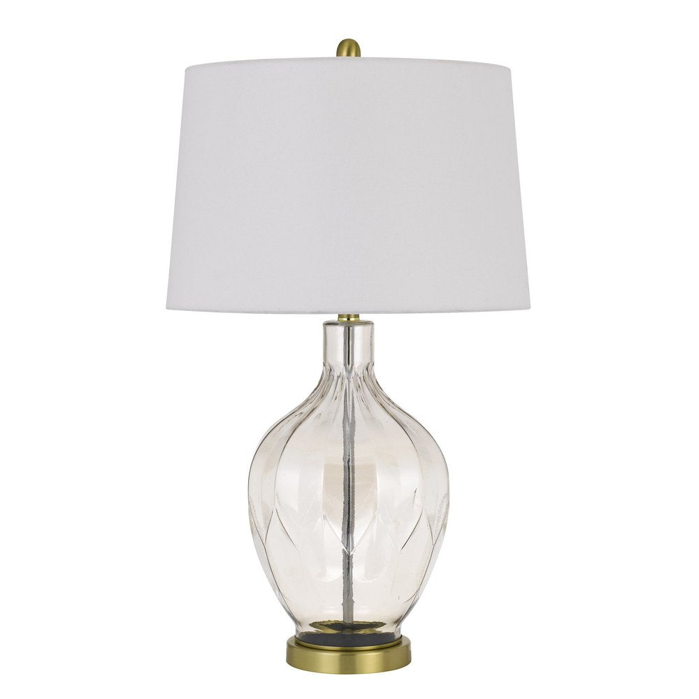 30" Clear Metal Table Lamp With Off White Drum Shade. Table lamp isolated on a plain white background, showing a off-white metal surface.