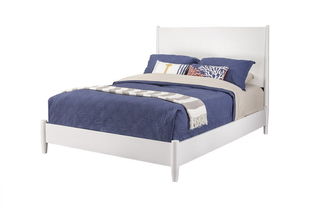 White solid wood California King bed frame with blue bedding and decorative pillows on a white background.