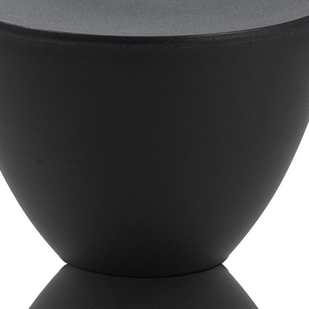 17" Black Heavy Duty Plastic Hourglass Outdoor Side Table detail shot of the black glass finish.