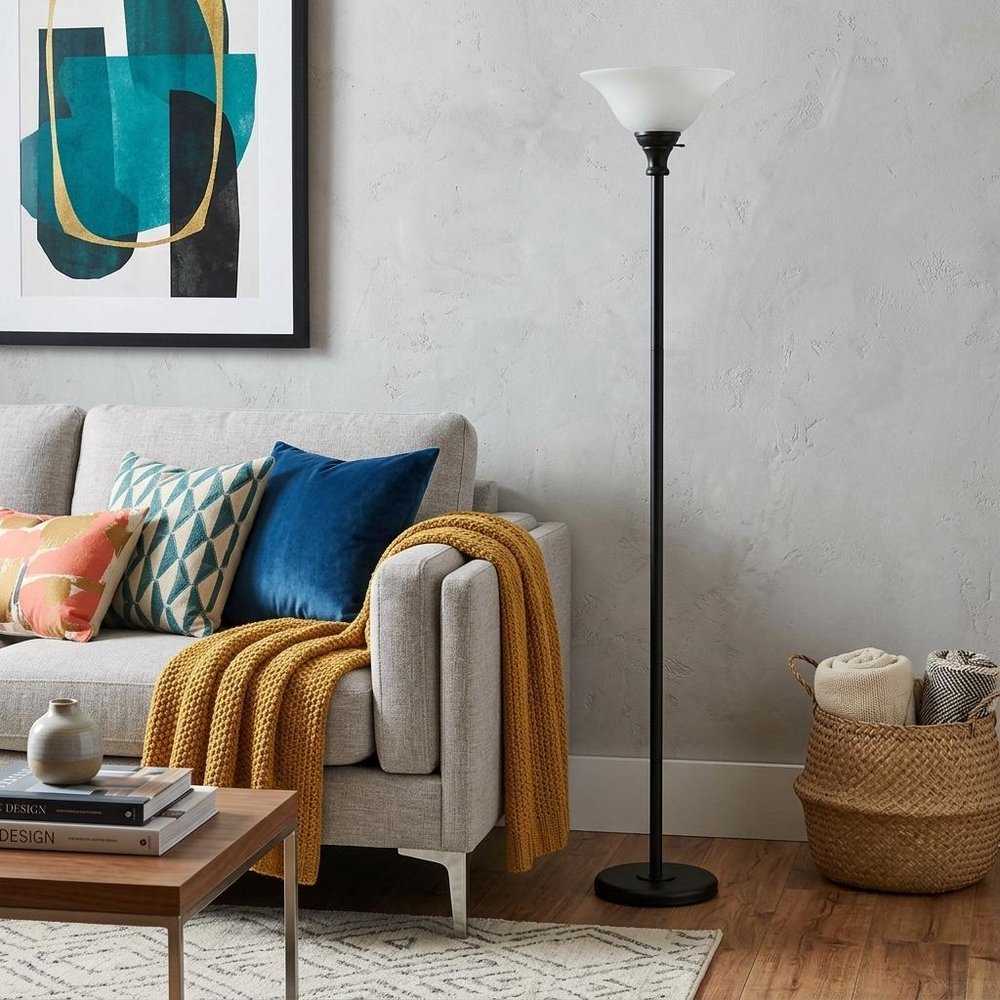 71" Black Torchiere Floor Lamp With Black Glass Dome Shade in a home interior
