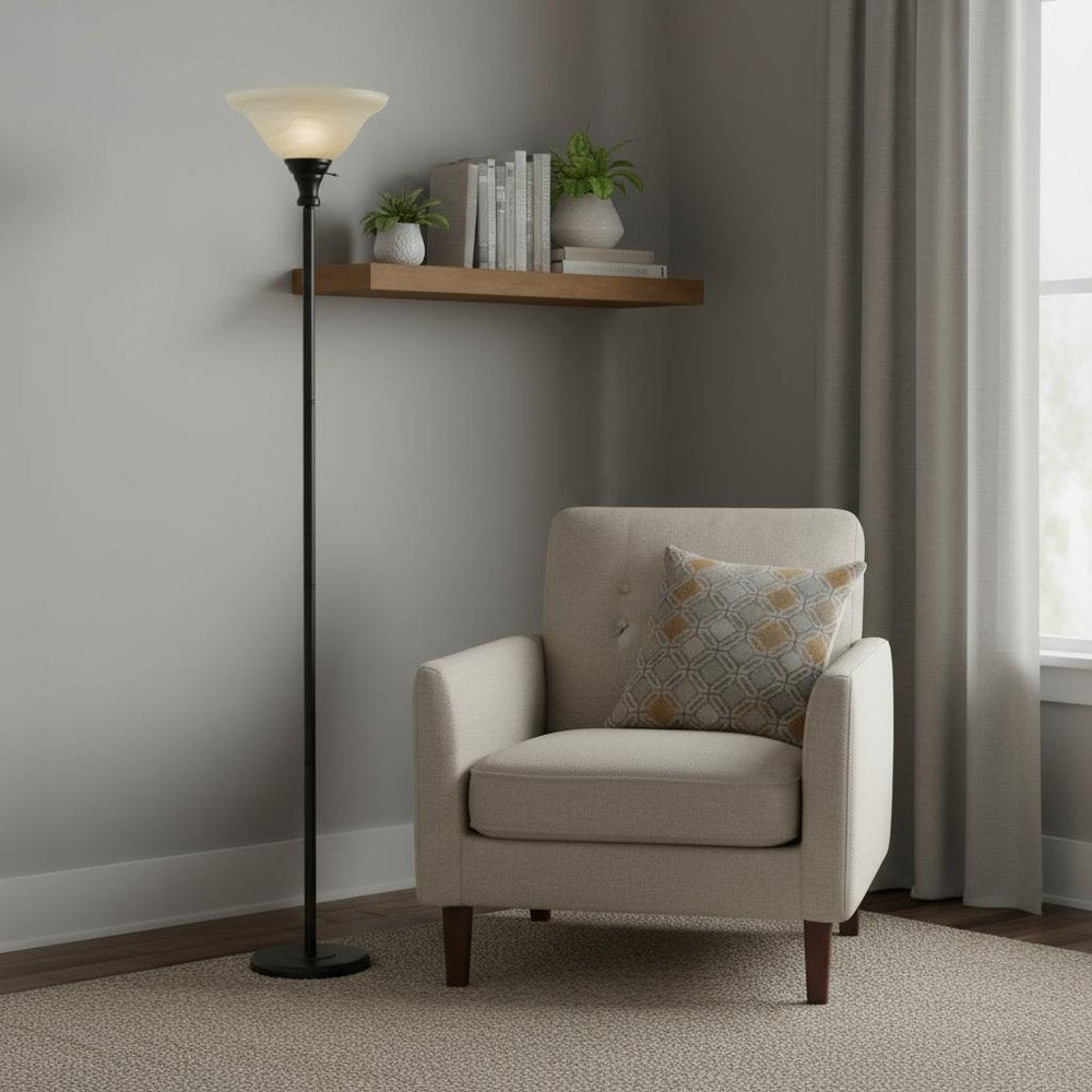 71" Bronze Torchiere Floor Lamp With Beige Frosted Glass Dome Shade in a home interior