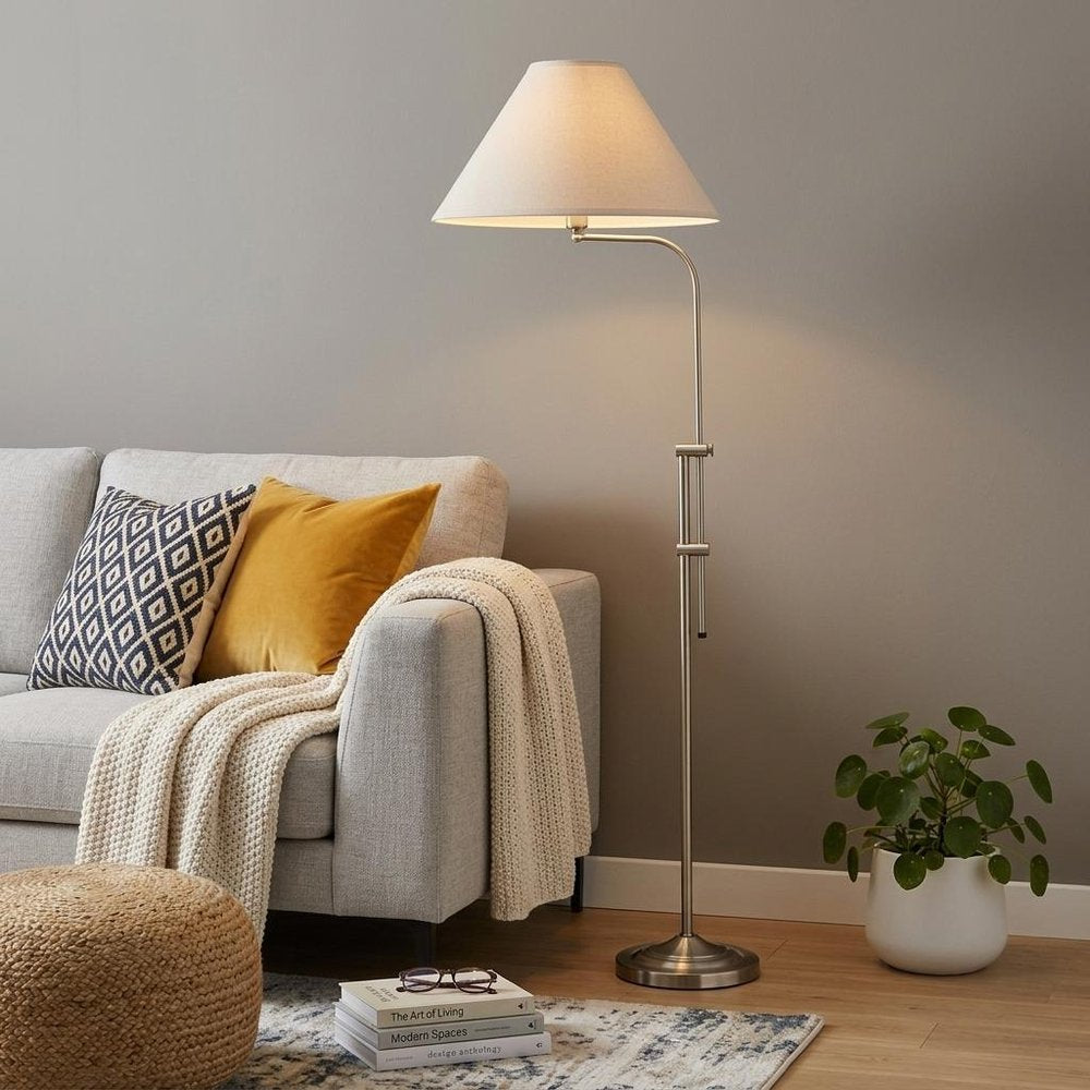 68" Nickel Adjustable Floor Lamp With White Fabric Empire Shade standing in a furnished interior on a dark wood floor in silver metal.