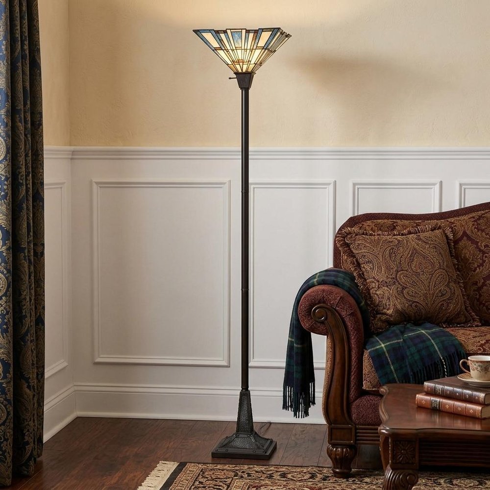 72" Bronze Torchiere Floor Lamp With Gray and Ivory Abstract Tiffany Glass Novelty Shade in a home interior