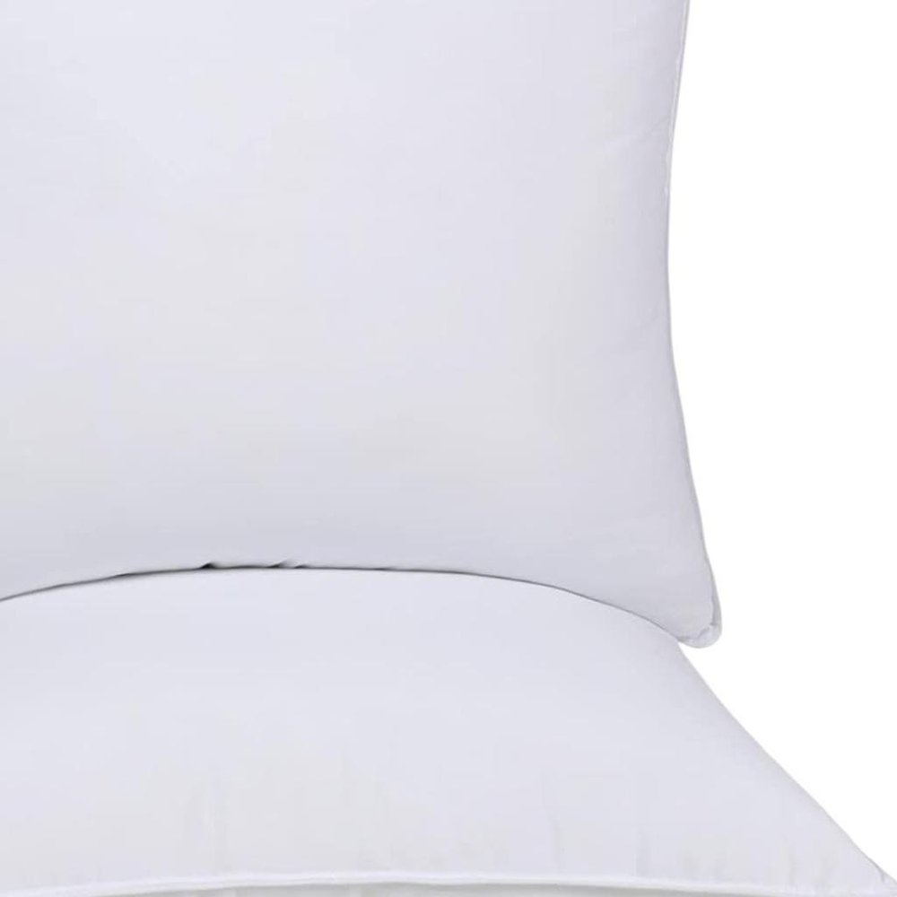 Set of Two Microfiber Down Alternative Medium Hypoallergenic European Size Bed Pillows on a white background