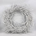 28" White Willow Dried Wreath. Wreath isolated on a plain white background, in a white rattan finish.