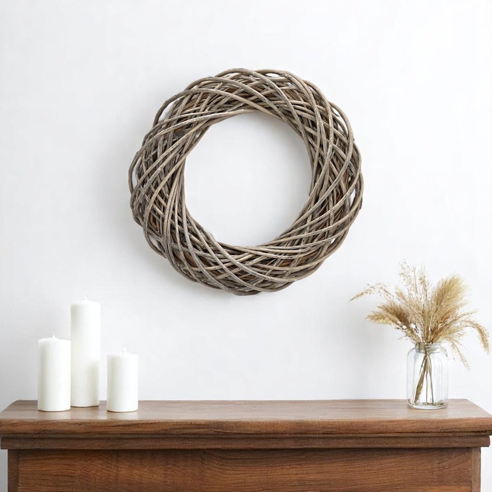 22" Natural Gray Willow Dried Wreath. Wreath isolated on a plain white background, finished in tan wood.
