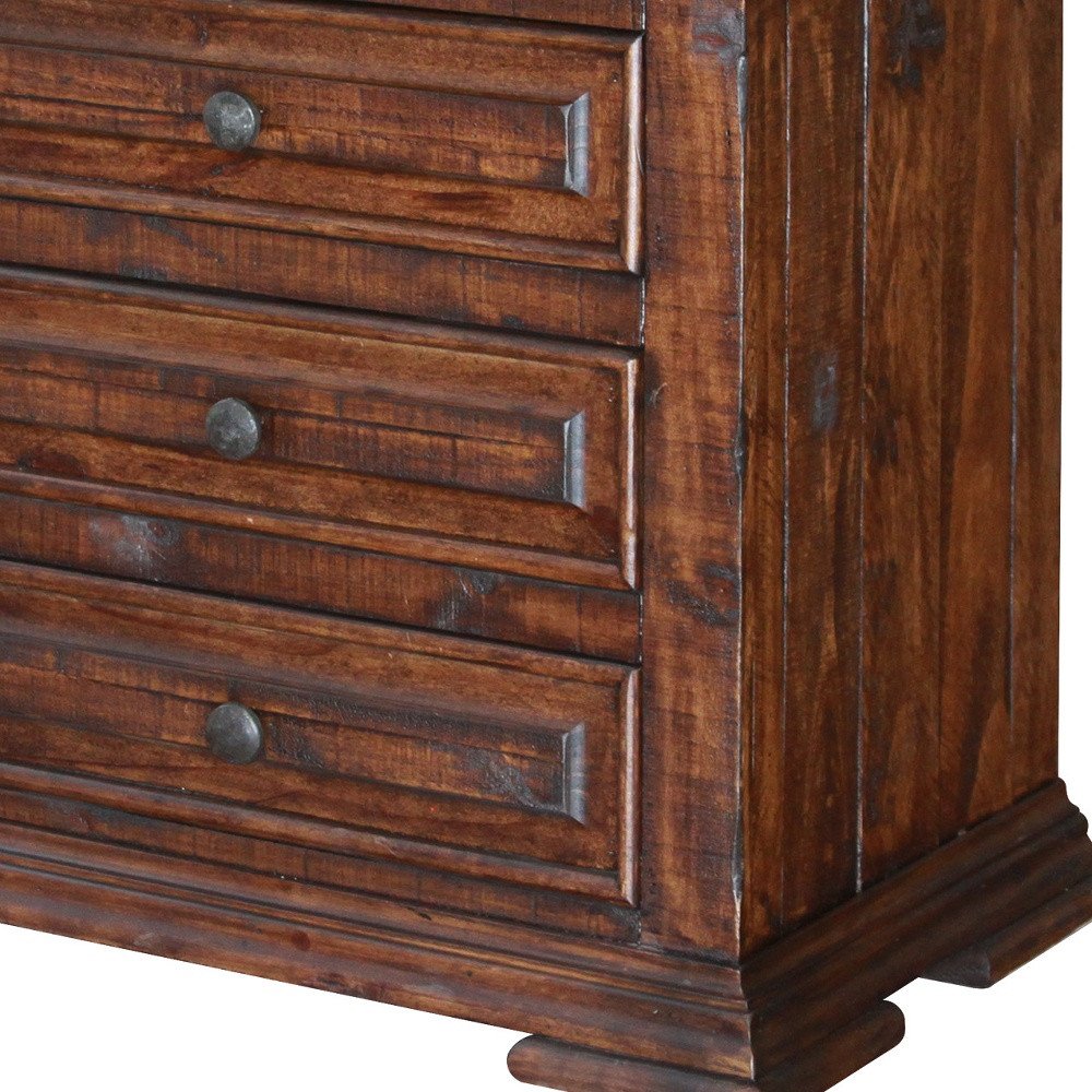 32" Brown Solid Wood Three Drawer Nightstand close-up highlighting the brown wood surface.