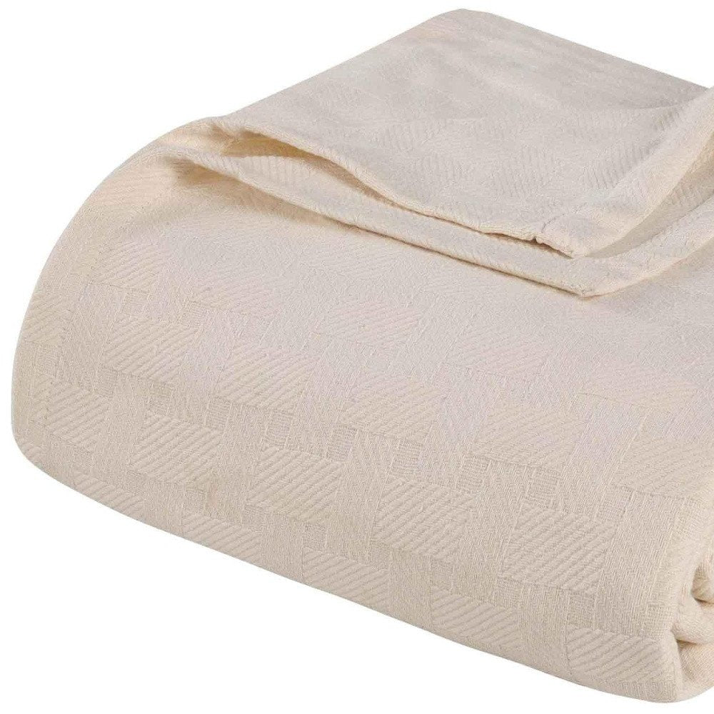 Twin Ivory Cotton Basketweave Geometric Blanket on a white background