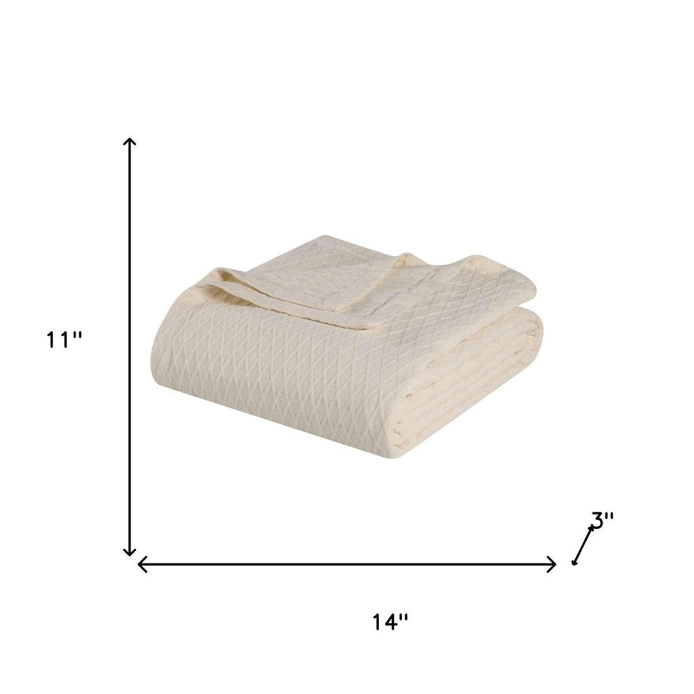 Twin Ivory Cotton Geometric Blanket on a white background