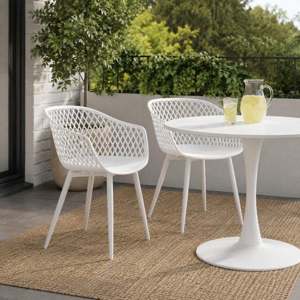 Set of Two Blue Heavy Duty Plastic Outdoor Stacking Dining Chairs in a home interior