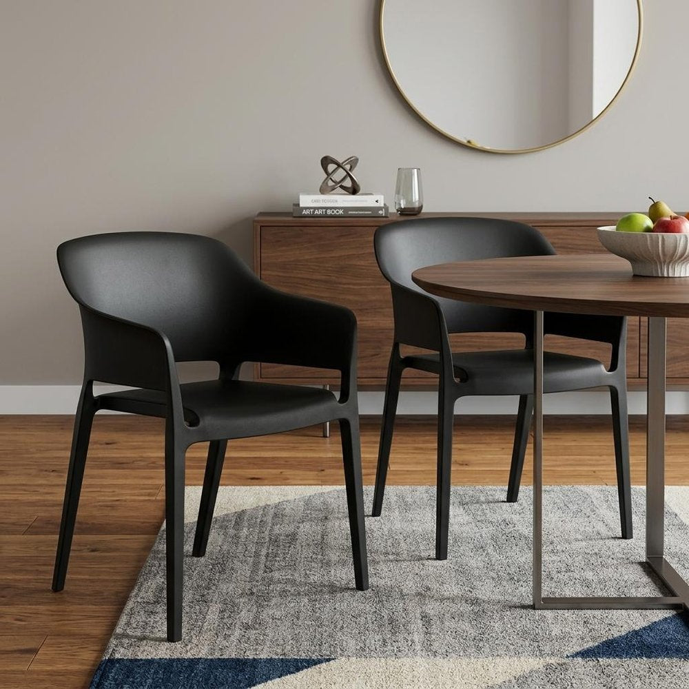 Set of Two Black Heavy Duty Plastic Outdoor Stacking Dining Chairs - 30.50" H x 21.50" W x 21.60" D