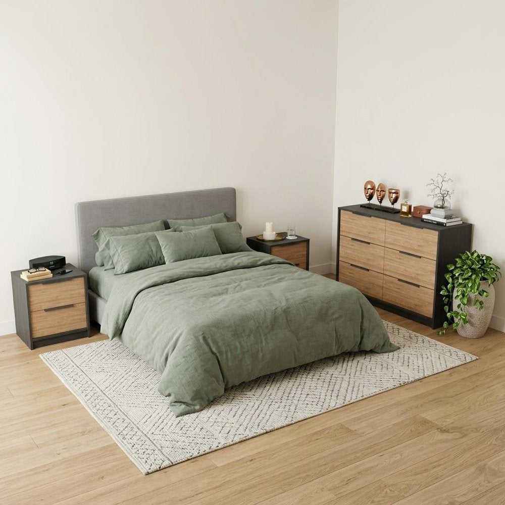 Three Piece Brown and Black Bedroom Set in a home interior