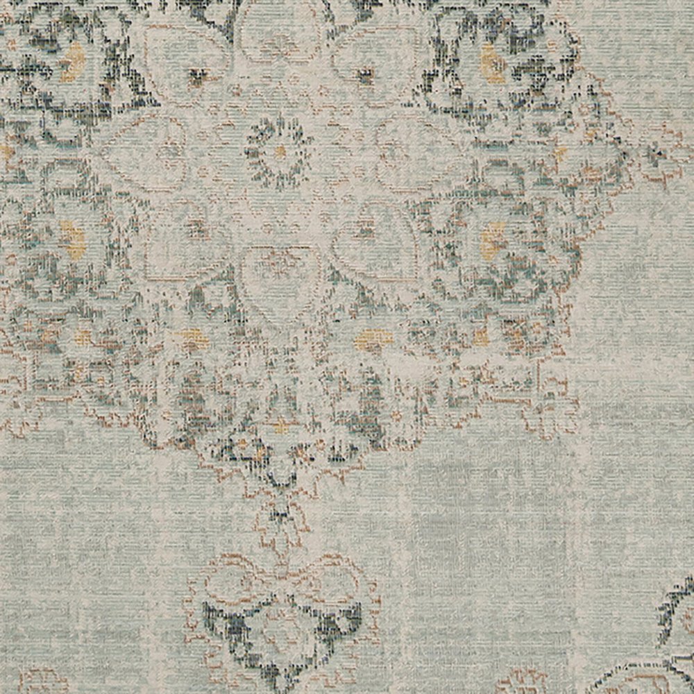 9' X 13' Tan And Light Green Medallion Area Rug close-up detail