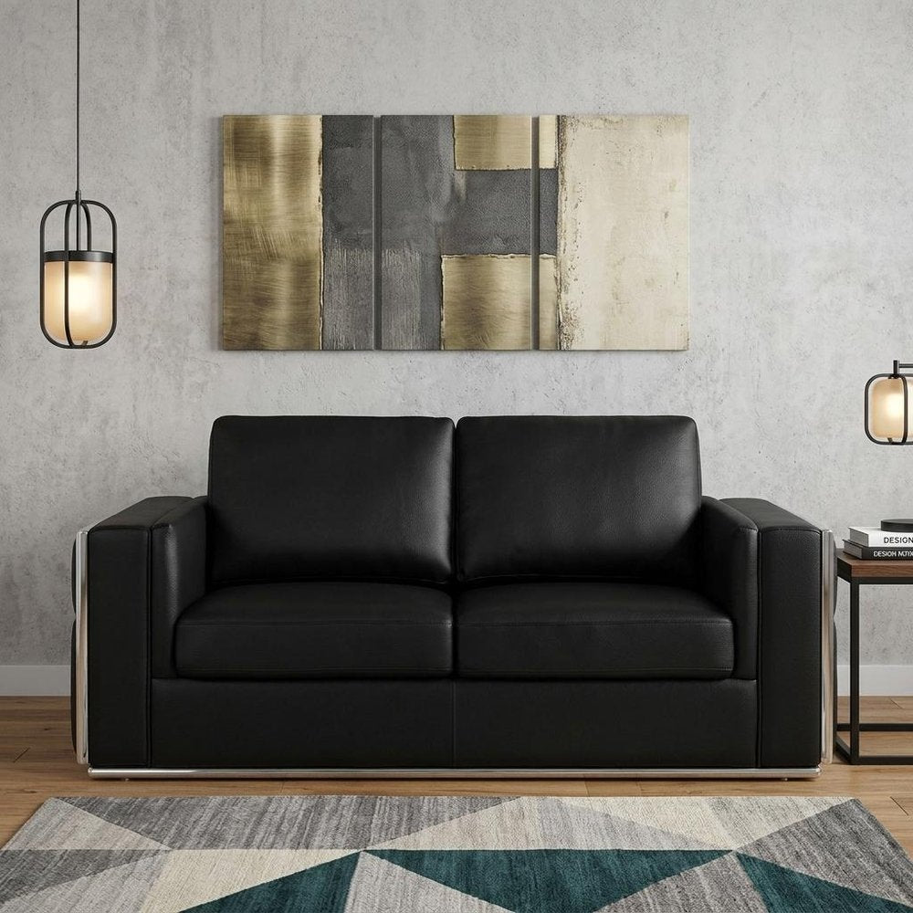 73" Black And Silver Metallic Top Grain Leather Loveseat in a home interior