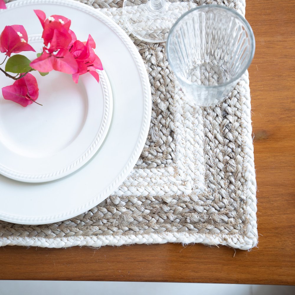 19" Set of Four Natural And Ivory Geometric Braided Jute Placemats. Dining linen in ivory linen.