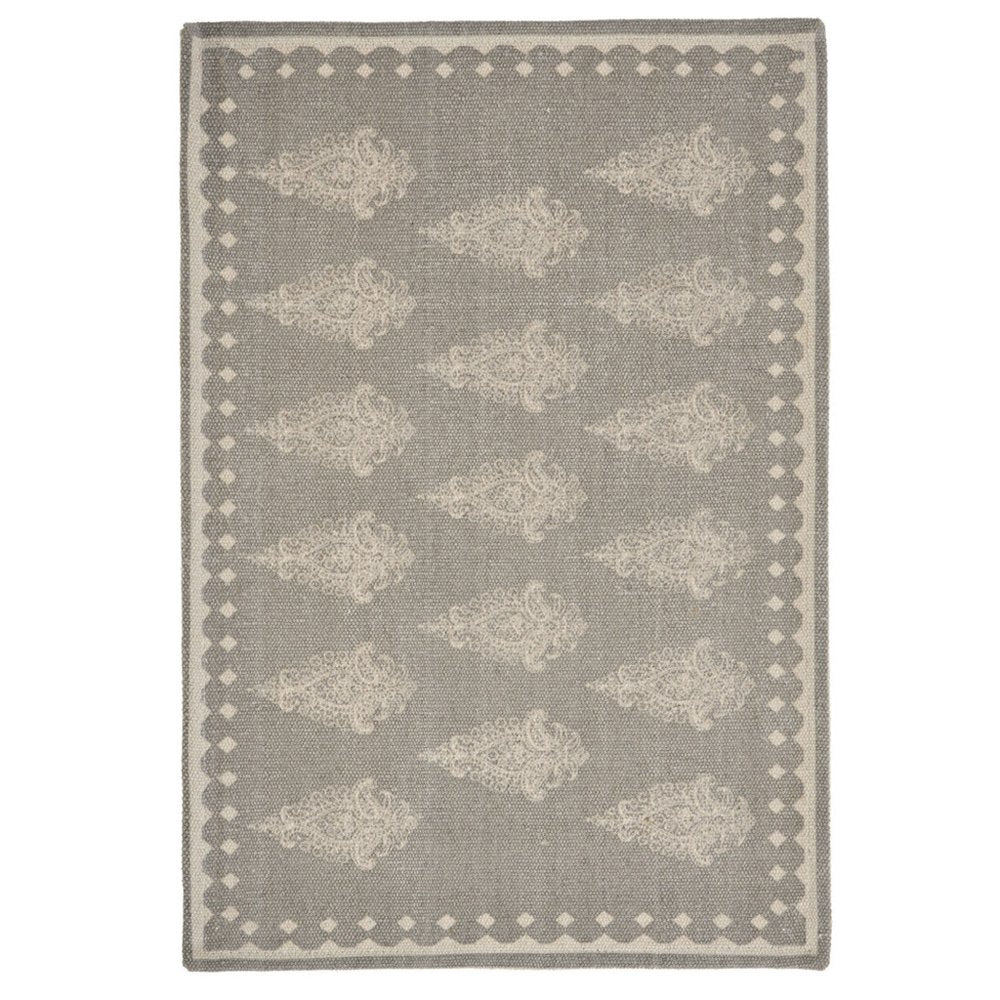 19" Set of Four Gray And Cream Geometric Medallion Cotton Placemats. Dining linen isolated on a plain white background, finished in cream linen.