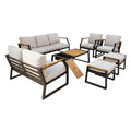 Seven Piece Black Metal Sofa Seating Group With Table on a white background