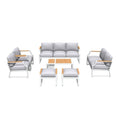 Seven Piece White Metal Sofa Seating Group With Table on a white background