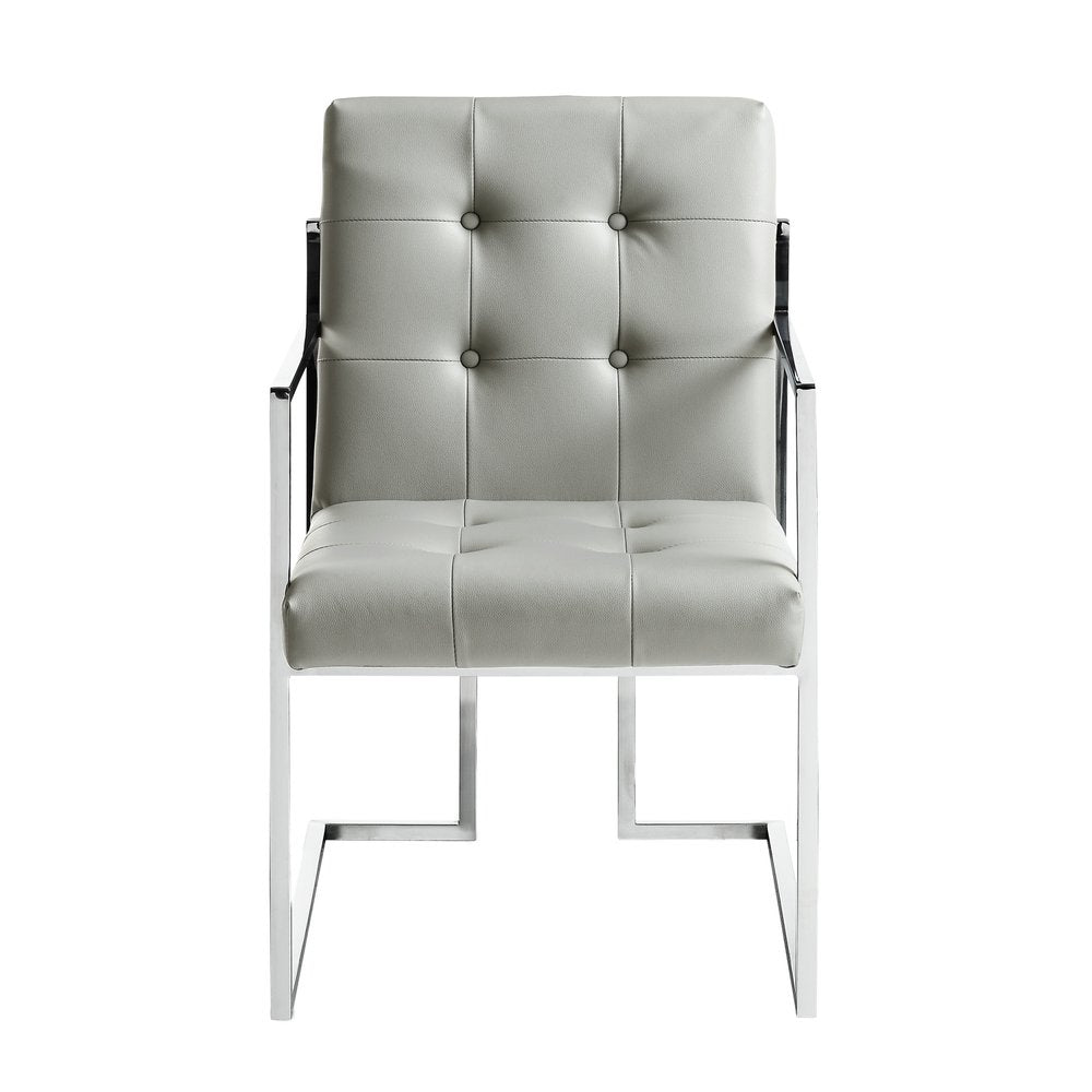 Set of Two Tufted Light Gray and Silver Metallic Upholstered Faux Leather Dining Arm Chairs on a white background