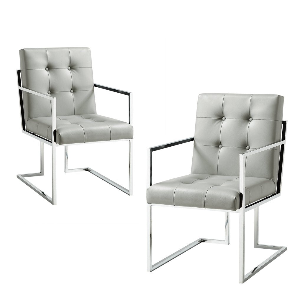 Set of Two Tufted Light Gray and Silver Metallic Upholstered Faux Leather Dining Arm Chairs on a white background