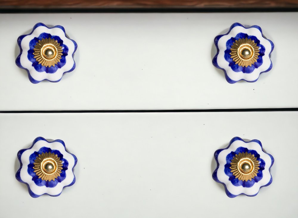 Set of Eight Blue And White Ceramic And Metal Drawer Pull Knobs in a home interior