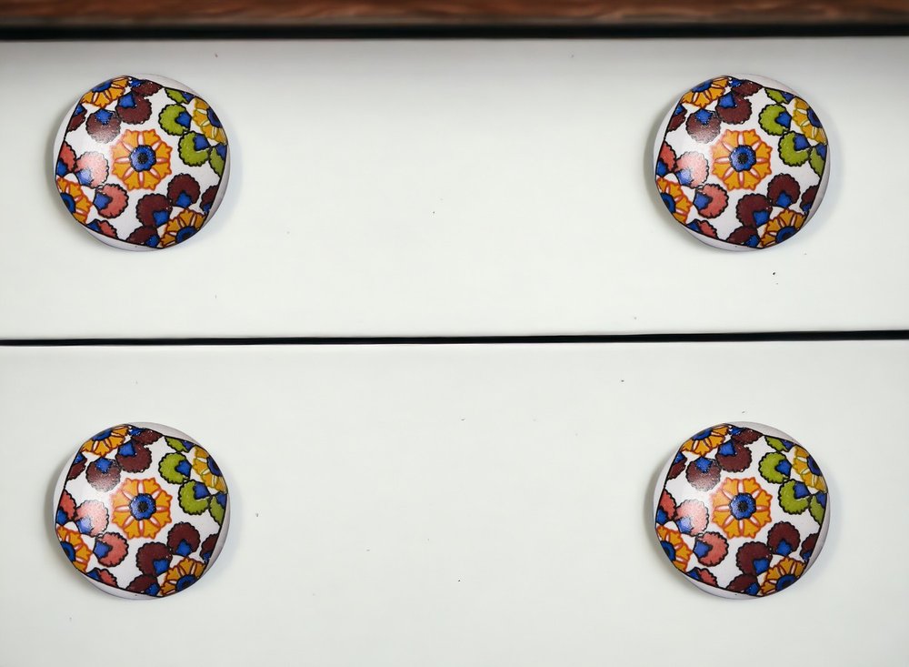 Set of Eight Blue And Orange Ceramic And Metal Drawer Pull Knobs in a home interior