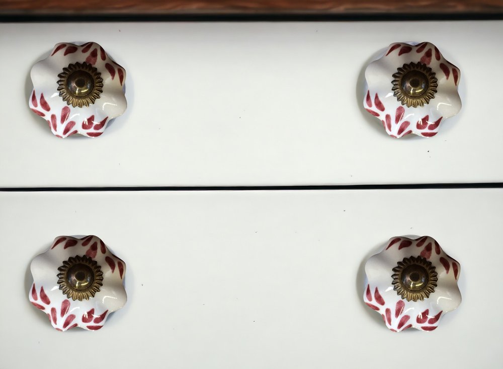 Set of Eight Brown And White Ceramic And Metal Drawer Pull Knobs in a home interior