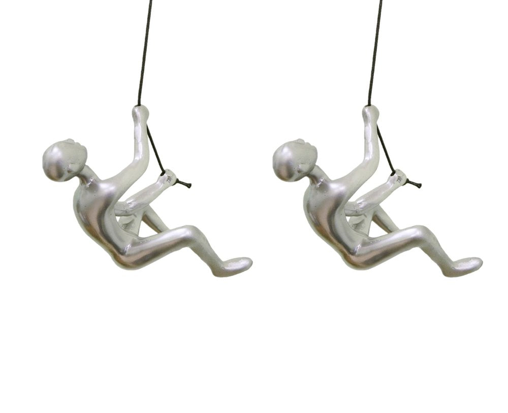 Set of Two Silver Resin Climbing Man Hanging Dimensional Sculpture on a white background